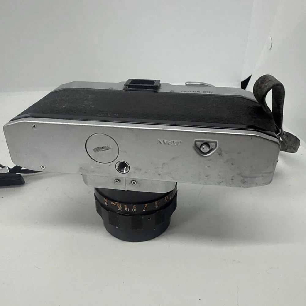 Bell & Howell 35mm Auto 35 Reflex SLR design 237 With vintage case- Working